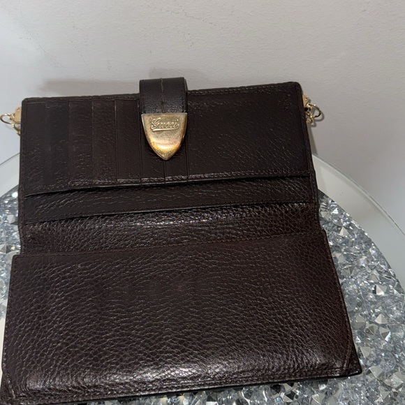 Gucci Chocolate Brown Long Wallet has its crossbody chain attached. - Picture 6 of 10